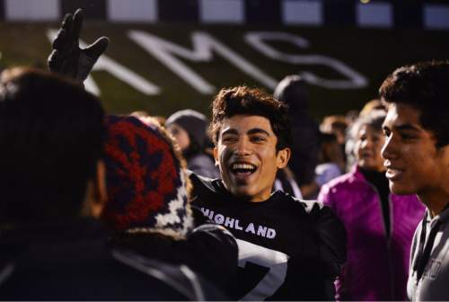 Steve Griffin  |  The Salt Lake Tribune

Highland kicker Kasra Rahmati is congratulated by fans after his game winning kick sailed through the uprights giving the Rams an unbelievable double overtime victory over Corner Canyon at Highland High School in Salt Lake City, Friday, November 6, 2015.  Highland scored 21 points in the final 3 minutes of the game to tie Corner Canyon at 35 and went on to win in double overtime 41-38.