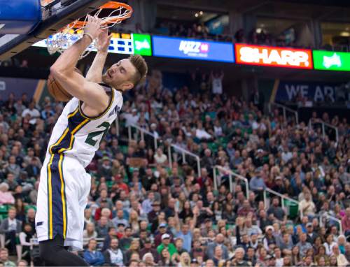 Lennie Mahler  |  The Salt Lake Tribune

Utah guard Gordon Hayward slams the ball on a fast break in the first half of a game against the Memphis Grizzlies at Vivint Smart Home Arena on Saturday, Nov. 7, 2015.