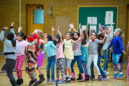 Chris Detrick  |  The Salt Lake Tribune
First graders do jumping jacks in gym class at Lincoln Elementary School Tuesday October 6, 2015.