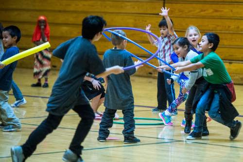 Chris Detrick  |  The Salt Lake Tribune
First graders play in gym class at Lincoln Elementary School Tuesday October 6, 2015.