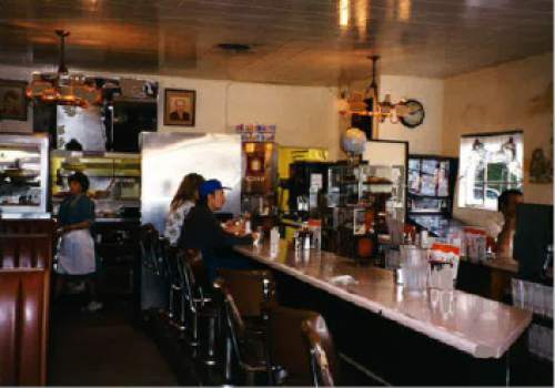 |  Courtesy Chipper Young

The counter inside Bill and Nada's Cafe, circa 1999, the year it closed.