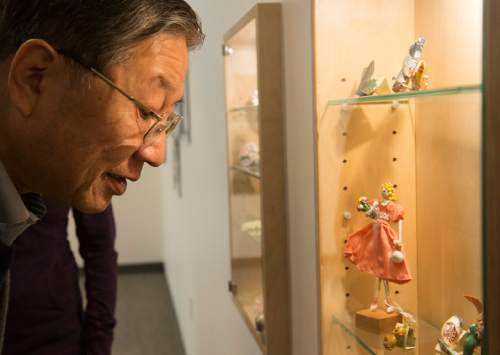 Rick Egan  |  The Salt Lake Tribune
Ken Shimanouchi, former Japanese ambassador to Brazil and Spain, looks at the Art made from shells by people in the Topaz internment camps at the Topaz Museum in Delta on Wednesday.