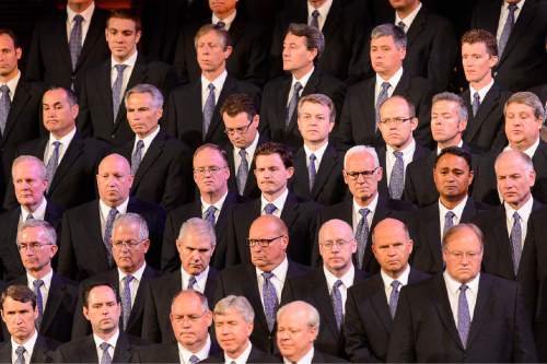 Trent Nelson  |  The Salt Lake Tribune
Members of the Mormon Tabernacle Choir stand at the beginning of the funeral for LDS apostle Boyd K. Packer, in Salt Lake City, Friday July 10, 2015.
