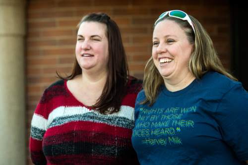 Chris Detrick  |  The Salt Lake Tribune
April Hoagland and Beckie Peirce smile during a press conference outside of the Juvenile Court in Price, Utah Friday November 13, 2015. Seventh District Juvenile Judge Scott Johansen has amended an order to remove a 9-month-old girl from the Price home of her same-sex foster parents and has instead scheduled a hearing on the matter.