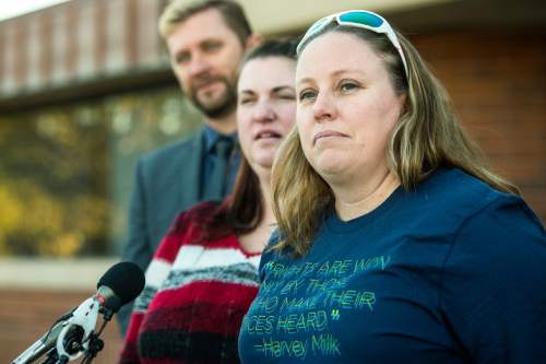 Chris Detrick  |  The Salt Lake Tribune
April Hoagland, Beckie Peirce and Equality Utah Executive Director Troy Williams listen to questions during a press conference outside of the Juvenile Court in Price, Utah Friday November 13, 2015. Seventh District Juvenile Judge Scott Johansen has amended an order to remove a 9-month-old girl from the Price home of her same-sex foster parents and has instead scheduled a hearing on the matter.
