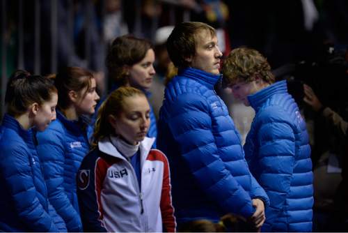 Scott Sommerdorf   |  The Salt Lake Tribune
Members of the French National speed skating team (in blue) stand during a moment of silence called for in response to the tragedy in Paris at the beginning of the Apolo Ohno Invitational at the Utah Olympic Oval,  Friday, November 13, 2015.