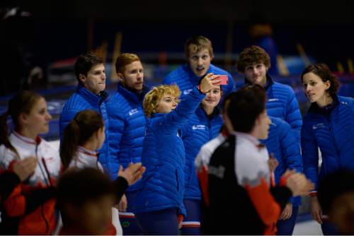 Scott Sommerdorf   |  The Salt Lake Tribune
Speed skater Louise Milesi takes a photo of her fellow athletes in the French National speed skating team prior to competing in the Apolo Ohno Invitational at the Utah Olympic Oval,  Friday, November 13, 2015.