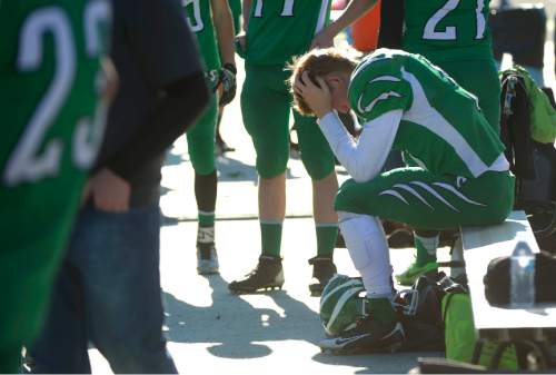 Leah Hogsten  |  The Salt Lake Tribune
South Summit's quarterback Nick Beasley (5) laments the loss in the remaining minutes of the game.  Beaver High School football team defeated South Summit High School 33-0 during their Class 2A State Championship game at Wildcat Stadium in Ogden, Saturday, November 14, 2015.