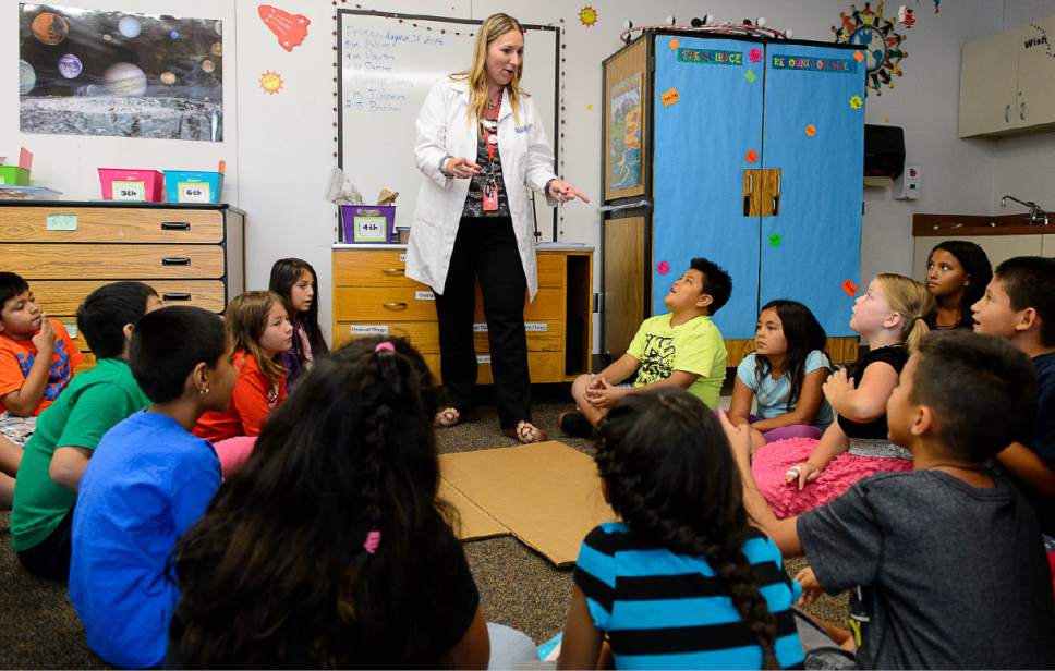 Trent Nelson  |  The Salt Lake Tribune
Cara Baldree, a teacher at Lincoln Elementary School in Salt Lake City, teaches science to fourth-graders, Friday August 28, 2015. The second year of SAGE scores for Utah schools will be released on Monday, August 31. Lincoln Elementary School saw the largest improvement on SAGE scores among the schools in Salt Lake City District.