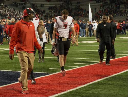 Rick Egan  |  The Salt Lake Tribune

Utah quarterback Travis Wilson (7) leaves the field after the Utes lost to the Arizona Wildcats 37-30 in double-overtime, in PAC-12 action against the Arizona Wildcats, in Tucson, Saturday, November 14, 2015.