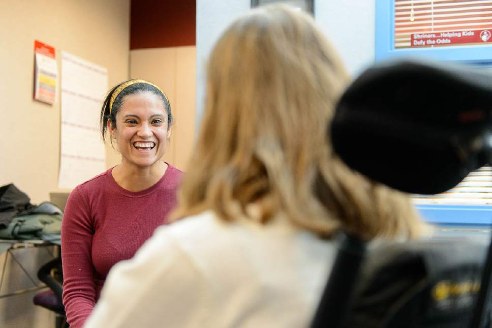 Trent Nelson  |  The Salt Lake Tribune
Dora Requena speaks with patient Gidget Winward at Shriners Hospital in Salt Lake City, Wednesday November 11, 2015.