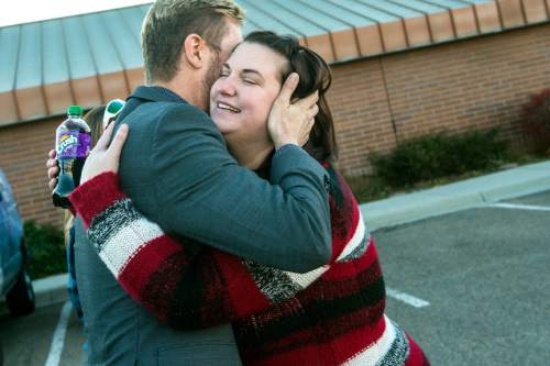 Chris Detrick  |  The Salt Lake Tribune
Equality Utah Executive Director Troy Williams hugs April Hoagland after a press conference outside of the Juvenile Court in Price, Utah Friday November 13, 2015. Seventh District Juvenile Judge Scott Johansen has amended an order to remove a 9-month-old girl from the Price home of her same-sex foster parents and has instead scheduled a hearing on the matter.