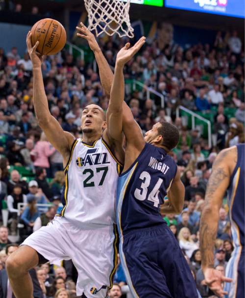 Lennie Mahler  |  The Salt Lake Tribune

Utah center Rudy Gobert gets past Memphis center Brandan Wright in the first half of a game against the Memphis Grizzlies at Vivint Smart Home Arena on Saturday, Nov. 7, 2015.