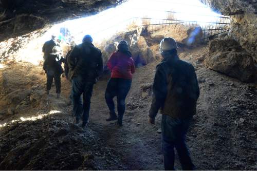 Scott Sommerdorf   |  The Salt Lake Tribune
Hikers on the cave tour leave the second cave visited - Jukebox Cave - near Wendover, Saturday, November 14, 2015.