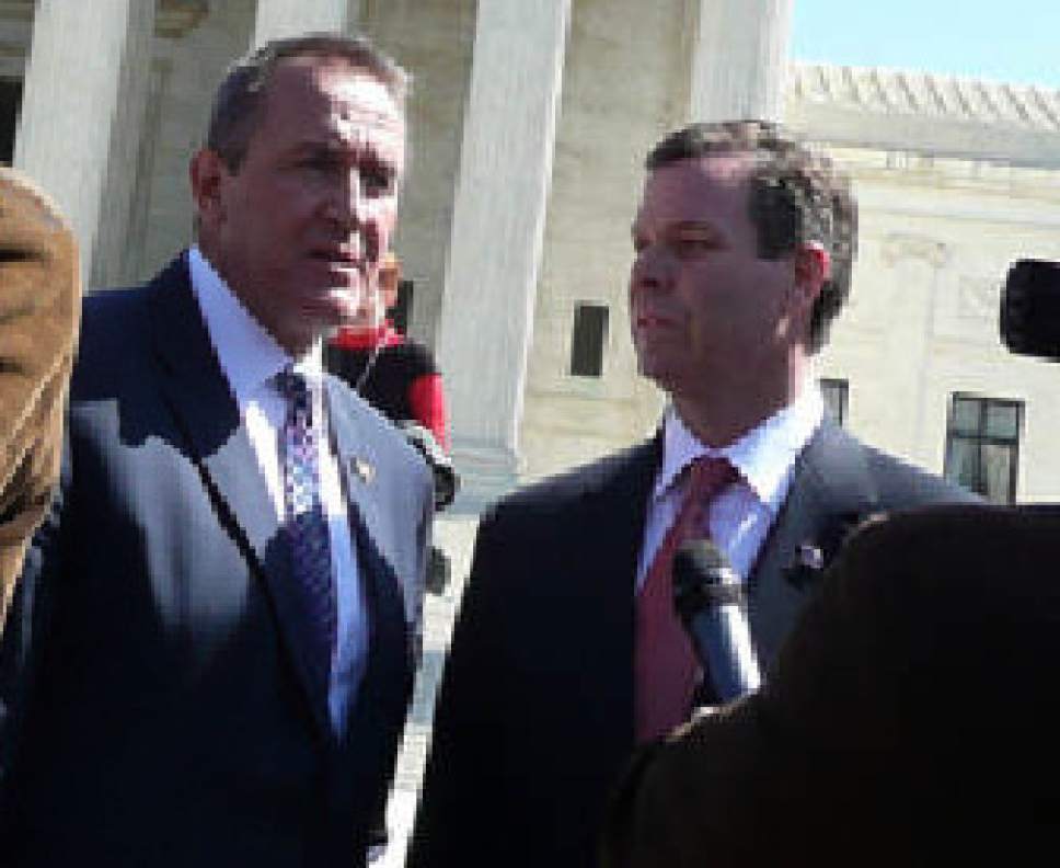 Matt Canham  |  The Salt Lake Tribune

Attorney General Mark Shurtleff and his chief deputy John Swallow record their observations of the Supreme Court hearing on the individual mandate.