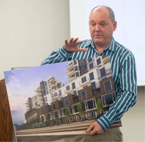 Rick Egan  |  The Salt Lake Tribune

Architect, Russell Platt explains the housing project to concerned citizens, who packed the Sugar House Community Council meeting at the Sprague Library, to hear from representatives from Boulder Ventures, who talked about their 492-unit apartment complex they plan to build in in Sugar House, Monday, November 16, 2015.
