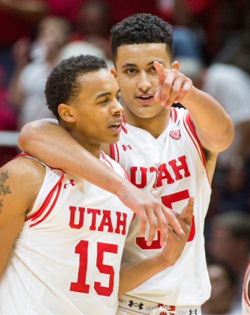 Rick Egan  |  The Salt Lake Tribune

Utah guard Lorenzo Bonam (15) and forward Kyle Kuzma (35) celebrate as the Utah extends their leaded late in the game  in basketball action, as the Utes defeated the San Diego State Aztecs 81-76, at the Huntsman Center, Tuesday, November 10, 2015.