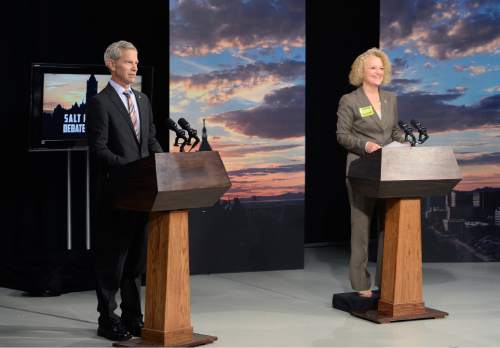 Scott Sommerdorf   |  The Salt Lake Tribune
Mayoral candidates Ralph Becker and Jackie Biskupski get settled at their podiums just after they were ushered into the television studio at KUED for the Salt Lake City mayor's debate, Thursday, October 8, 2015.