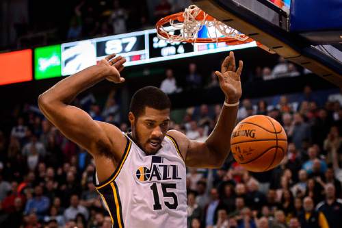 Trent Nelson  |  The Salt Lake Tribune
Utah Jazz forward Derrick Favors (15) gives the Jazz a 4-point lead with less than 24 seconds to go as the Utah Jazz host the Toronto Raptors, NBA basketball at Vivint Smart Home Arena in Salt Lake City, Wednesday November 18, 2015.