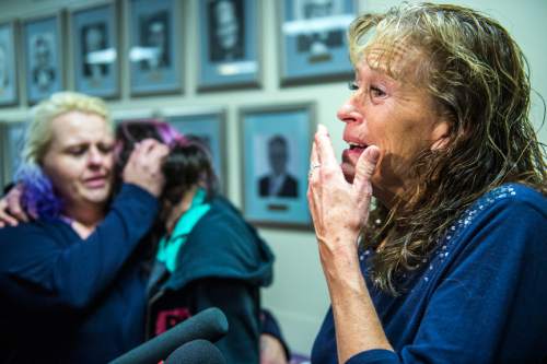 Chris Detrick  |  The Salt Lake Tribune
Kelly Wilkinson talks about her grandson Joe Martinez, 16, who was killed in a hit and run, during a press conference at the Utah Department of Health Wednesday November 18, 2015. In the background Joe's mom Casey Wilkinson hugs his friend Shayla Hughey. In 2014, 29 teens were killed on Utah roads.