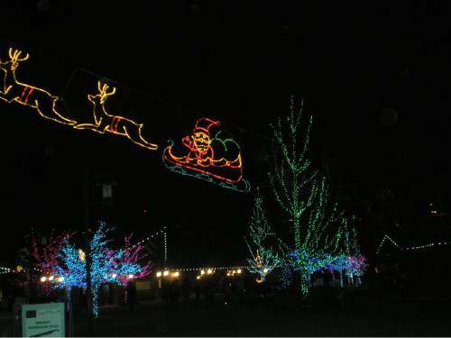 |  Tribune File Photo

Utah's Hogle Zoo has turned into a festive light display, ZooLights, increasing it's winter attendance dramatically, December 18, 2007.