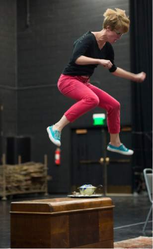 Steve Griffin  |  The Salt Lake Tribune

Abigail Levis, as the child, jumps from a chest during rehearsal for "The Child and the Enchantments," a Utah Opera/Utah Symphony joint venture, at the Utah Opera building in Salt Lake City, Tuesday, November 3, 2015.