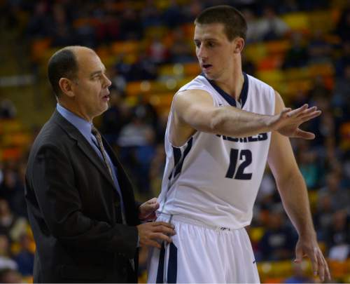 Leah Hogsten  |  The Salt Lake Tribune
Utah State Aggies head coach Tim Duryea talks with Utah State Aggies forward Lew Evans (12). Utah State Aggies defeated Adams State Grizzlies, 83-68, Tuesday, November 17, 2015 at Smith Spectrum.