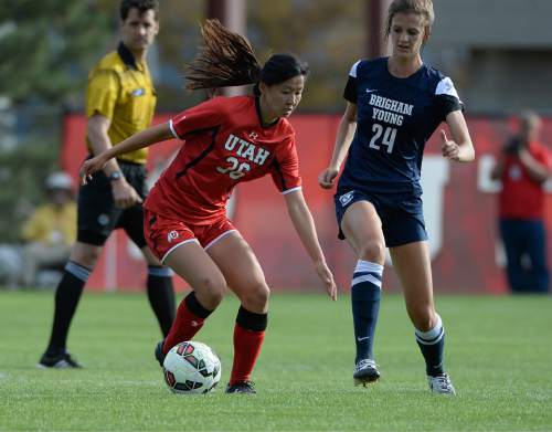 Scott Sommerdorf   |  The Salt Lake Tribune
Utah's Mikayla Elmer versus BYU. Katie Taylor scored on a second half penalty kick, and Utah women's soccer defeated BYU 1-0 in Salt Lake City, Friday, September 5, 2014.