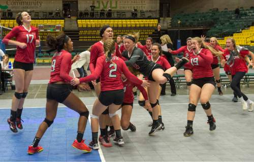 Rick Egan  |  The Salt Lake Tribune
 
The Bountiful Braves celebrate their state title win over the Timpview Thunderbirds, in the 4A prep volleyball championship game, at UVU in Orem, Saturday, November 7, 2015.