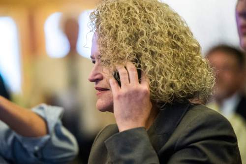 Chris Detrick  |  The Salt Lake Tribune
Jackie Biskupski talks with Mayor Ralph Becker on the phone before a election canvass event at City Hall Tuesday November 17, 2015. Jackie Biskupski is the mayor-elect of Salt Lake City.