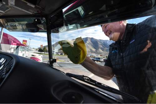 Francisco Kjolseth | The Salt Lake Tribune
Marty Taft, a senior technician with Peloton Technology readies a truck for a live demonstration of new "connected vehicle" technology. The system which allows two semi-trucks to platoon together, similar to drafting off a bicycle, were demonstrated along I-80 North of Tooele. The two trucks connect within 30 to 100 feet of each depending on conditions, simultaneously brake, accelerate and react to road hazards up to 800 feet away in order to reduce fuel costs and increase safety by cutting down on reaction time in braking.