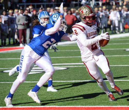 Steve Griffin  |  The Salt Lake Tribune

Logan wide receiver Spencer Corbett hauls in a touchdown pass during the Class 3AA state football championship game between Dixie and Logan at Rice-Eccles Stadium in Salt Lake City, Friday, November 20, 2015.  Logan defeated Dixie to win the championship.