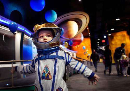 Scott Sommerdorf   |  The Salt Lake Tribune
Five year old Oliver Goates dressed appropriately for Clark Planetarium's celebration of it's 50th anniversary of having a planetarium in Salt Lake City on Saturday.