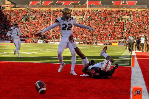 Trent Nelson  |  The Salt Lake Tribune
UCLA Bruins defensive back Nate Meadors (22) signals incomplete while standing over Utah Utes wide receiver Kenneth Scott (2) in the end zone as the University of Utah hosts UCLA, NCAA football at Rice-Eccles Stadium in Salt Lake City, Saturday November 21, 2015.