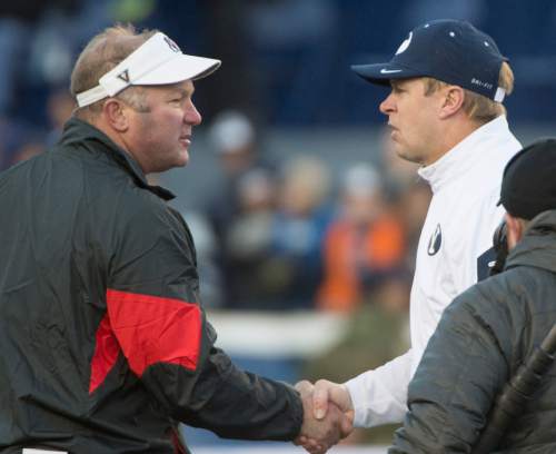 Rick Egan  |  The Salt Lake Tribune

Brigham Young Cougars head coach Bronco Mendenhall shakes hands with  Fresno State Bulldogs head coach Tim DeRuyter, after  BYU defeated the Fresno Bulldogs 52 -10, at Lavell Edwards stadium, Tuesday, November 21, 2015.