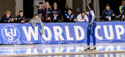 Trent Nelson  |  The Salt Lake Tribune
Brittany Bowe points to friends and fans after setting a world record in the ladies 1000m speed skating at the ISU World Cup, at the Utah Olympic Oval in Kearns, Sunday November 22, 2015.