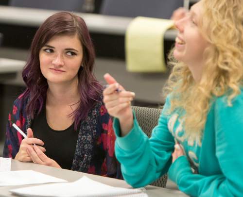 Rick Egan  |  The Salt Lake Tribune

Makayla Fowler(left) discusses a topic with Heather Downing, during a workshop on healthy relationships, sponsored by Weber State University, Davis Student Services at the WSU Davis Building in Layton, Thursday, November 12, 2015.