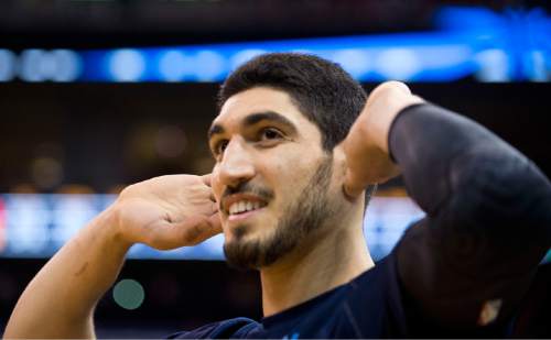 Lennie Mahler  |  The Salt Lake Tribune

Enes Kanter of the Oklahoma City Thunder responds to boos from the crowd during player introductions before facing his old team at EnergySolutions Arena on Saturday, March 28, 2015.