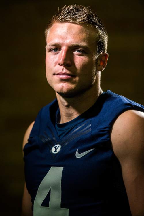 Chris Detrick  |  The Salt Lake Tribune
Brigham Young Cougars quarterback Taysom Hill (4) poses for a portrait Wednesday August 12, 2015.
