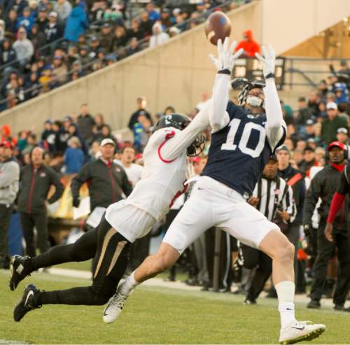 Rick Egan  |  The Salt Lake Tribune

Brigham Young Cougars wide receiver Mitch Mathews (10) tries to get his hands on a pass, as Fresno State Bulldogs defensive back Jamal Ellis (2) defends, as BYU defeated the Fresno Bulldogs 52 -10, at Lavell Edwards stadium, Tuesday, November 21, 2015.