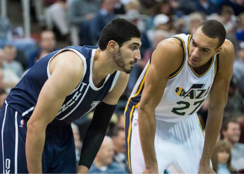 Rick Egan  |  The Salt Lake Tribune

Oklahoma City Thunder center Enes Kanter (11) and Utah Jazz center Rudy Gobert (27) share a few words during a free throw, in NBA action, as the Utah Jazz lose to the Oklahoma City Thunder 111-89, in Salt Lake City, Monday, November 23, 2015.