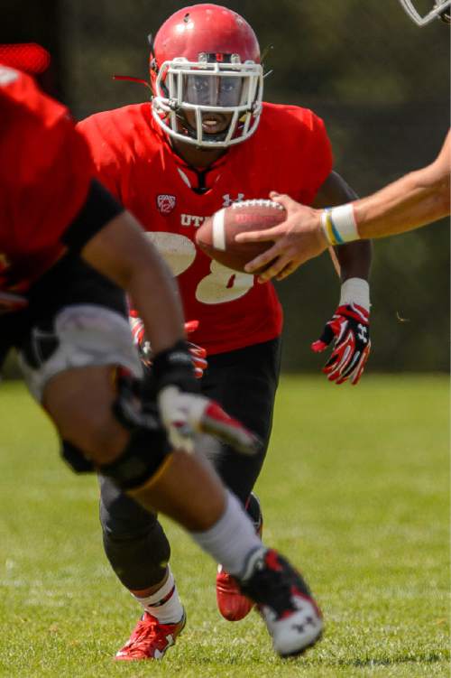Trent Nelson  |  The Salt Lake Tribune
University of Utah running back Joe Williams runs the ball at football practice in Salt Lake City, Tuesday August 11, 2015.