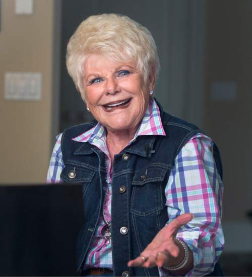 Rick Egan  |  The Salt Lake Tribune

Edna Anderson-Taylor, smiles as she plays  the piano in her Salt Lake City home. Taylor, known by many as "Miss Julie" from her 17 years as host of the "Romper Room" children's television show, Tuesday, November 3, 2015.