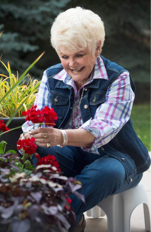 Rick Egan  |  The Salt Lake Tribune

Edna Anderson-Taylor, loves working in her garden.  Taylor, known by many as "Miss Julie" from her 17 years as host of the "Romper Room" children's television show, Tuesday, November 3, 2015.