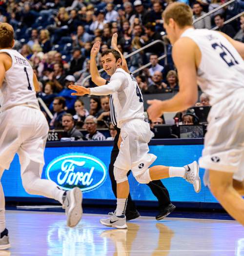 Trent Nelson  |  The Salt Lake Tribune
Brigham Young Cougars guard Nick Emery (4) celebrates a three-pointer as BYU hosts Mississippi Valley State, NCAA basketball at the Marriott Center in Provo, Wednesday November 25, 2015.