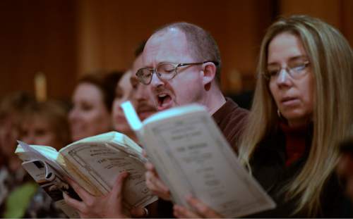 Rick Egan  | The Salt Lake Tribune 

Members of the audience sing, during the Utah Symphony's annual "Messiah" Sing-In at Abravanel Hall, Saturday, November 30, 2013.