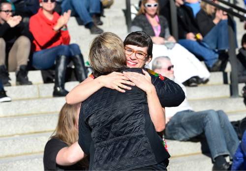 Scott Sommerdorf   |  The Salt Lake Tribune
Kate Kelly hugs her mother Donna Kelly who had just spoken at the first-ever Utah Faith Fair and Rally for Love, Equality, Family, and Acceptance, Saturday, November 21, 2015.