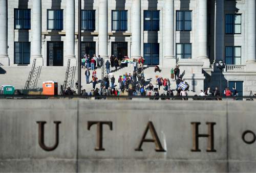 Scott Sommerdorf   |  The Salt Lake Tribune
Attendees at the first ever Utah Faith Fair and Rally for Love, Equality, Family, and Acceptance, leave the capitol after the rally. Reacting to recent policy changes by the LDS Church, Salt Lake City organizers held the first-ever Utah Faith Fair and Rally for Love, Equality, Family, and Acceptance, Saturday, November 21, 2015.