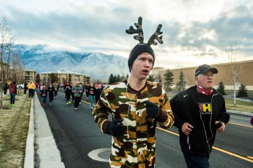 Chris Detrick  |  The Salt Lake Tribune
Racers compete in the 10th annual Utah Human Race in Draper Thursday November 26, 2015. Over 5,400 people participated in the family-friendly 5K/10K, with proceeds going to the Utah Food Bank.