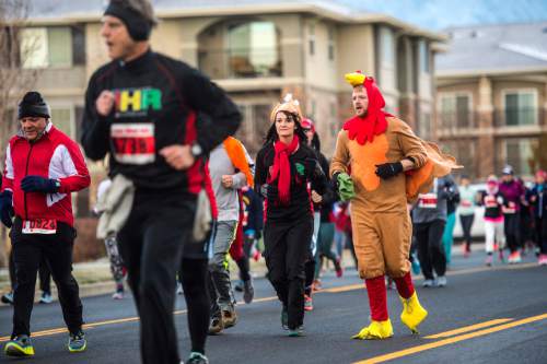 Chris Detrick  |  The Salt Lake Tribune
Racers compete in the 10th annual Utah Human Race in Draper Thursday November 26, 2015. Over 5,400 people participated in the family-friendly 5K/10K, with proceeds going to the Utah Food Bank.